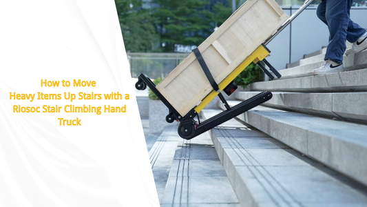 A person using a Riosoc stair climbing hand truck to move a heavy wooden box up a set of stairs, demonstrating the ease and efficiency of the electric hand truck in a real-life scenario.