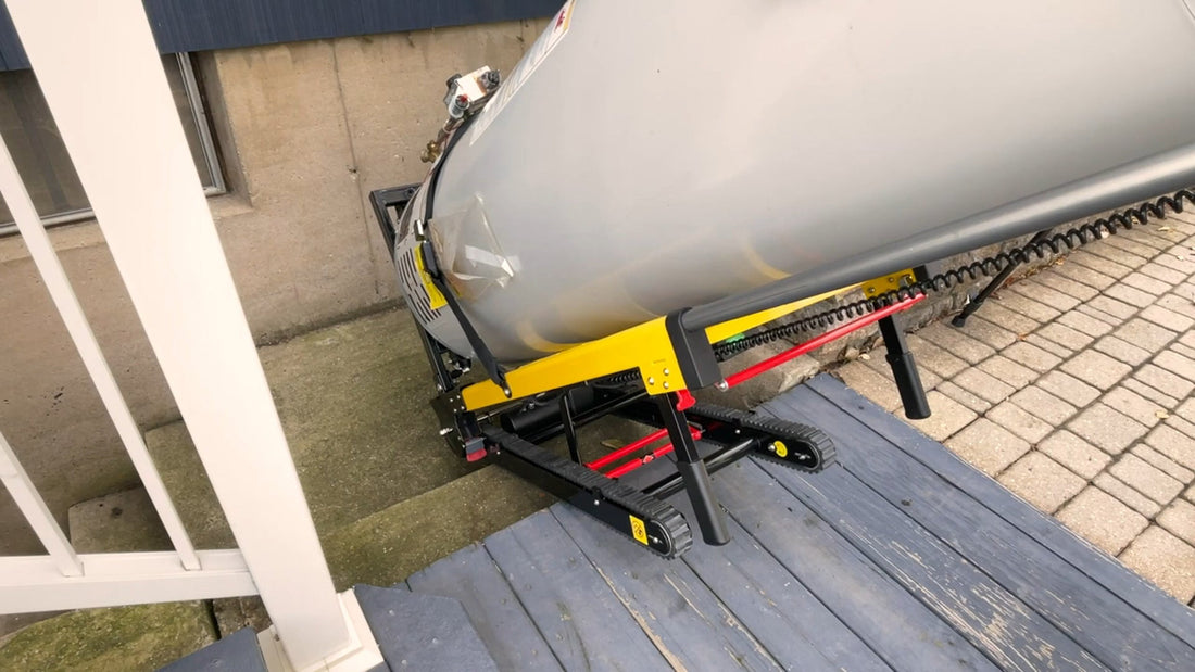 Riosoc electric stair climber hand truck moving a heavy water heater up stairs, showcasing its powerful and stable performance on steep surfaces.